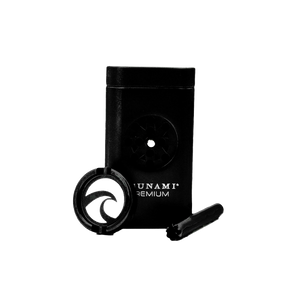 Tsunami 4-in-1 magnetic dugout kit open, showing grinder, storage chamber, loading tool, and magnetic closure on plain background.