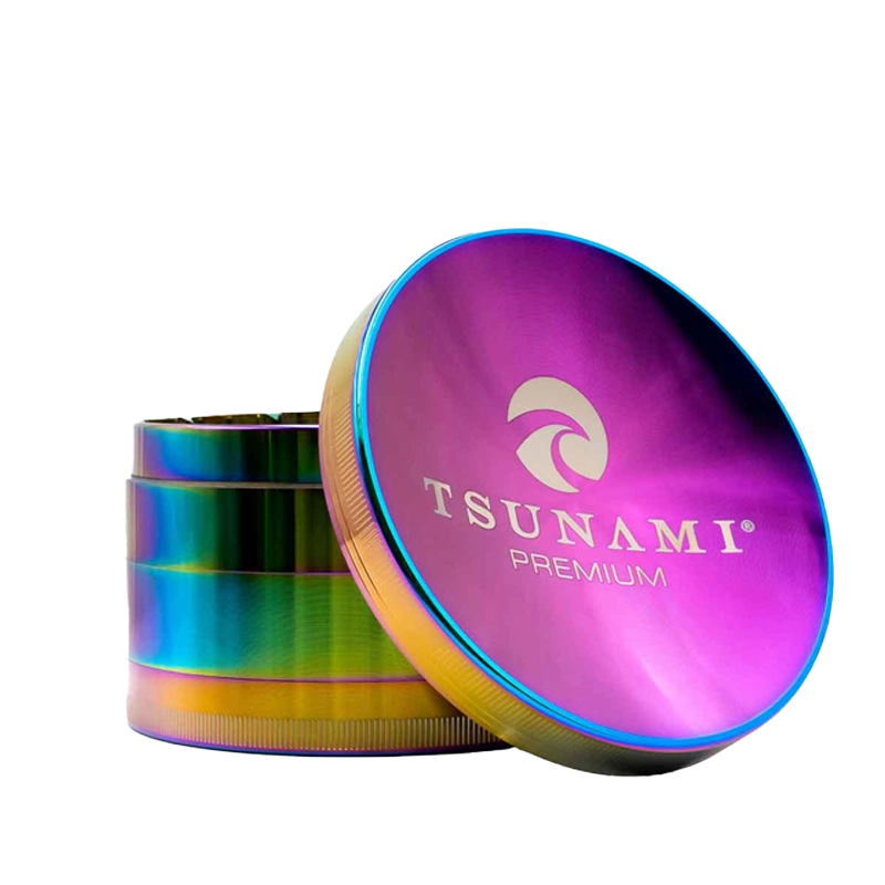 A large 100mm Tsunami herb grinder with a caved top and multiple chambers, displaying sharp diamond-cut teeth on a plain background.